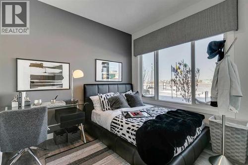 499 Lawthorn Way Se, Airdrie, AB - Indoor Photo Showing Bedroom