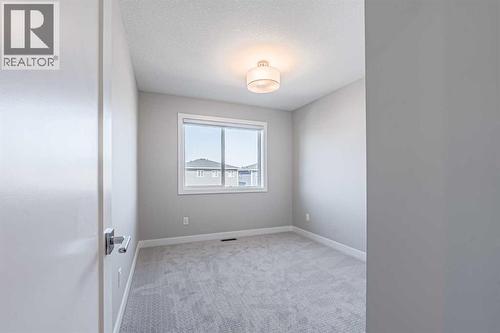 129 Dawson Wharf View, Chestermere, AB - Indoor Photo Showing Other Room
