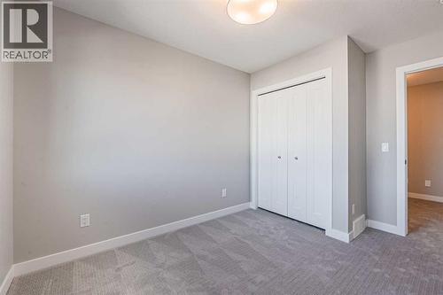 129 Dawson Wharf View, Chestermere, AB - Indoor Photo Showing Other Room