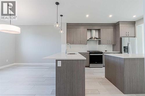 129 Dawson Wharf View, Chestermere, AB - Indoor Photo Showing Kitchen With Upgraded Kitchen