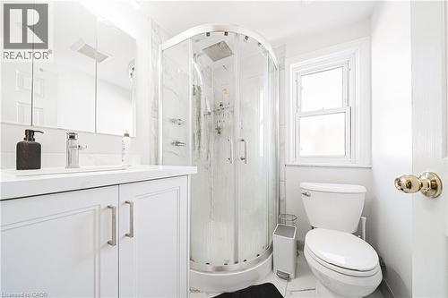 Full bath with vanity and a marble finish shower - 143 Fairfield Avenue, Hamilton, ON - Indoor Photo Showing Bathroom