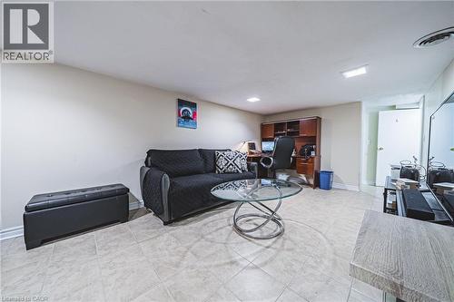 Living room featuring baseboards and an office area - 143 Fairfield Avenue, Hamilton, ON - Indoor