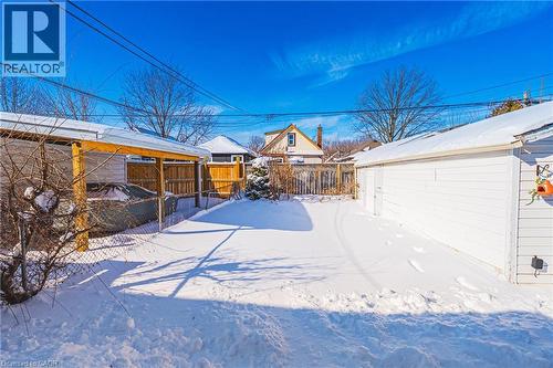 View of yard layered in snow - 143 Fairfield Avenue, Hamilton, ON - Outdoor