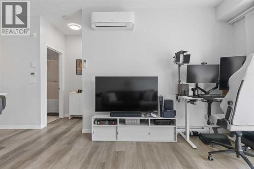 1104, 220 Seton Grove Se, Calgary, AB - Indoor Photo Showing Gym Room