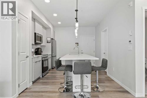 1104, 220 Seton Grove Se, Calgary, AB - Indoor Photo Showing Kitchen With Upgraded Kitchen