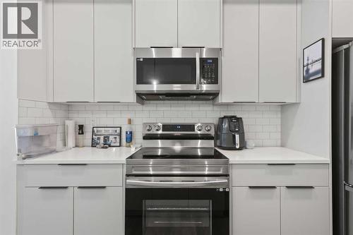 1104, 220 Seton Grove Se, Calgary, AB - Indoor Photo Showing Kitchen With Upgraded Kitchen