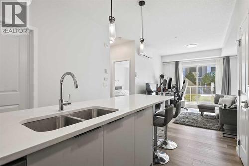 1104, 220 Seton Grove Se, Calgary, AB - Indoor Photo Showing Kitchen With Double Sink