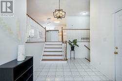 Oversized front foyer with ceramic tiles. - 