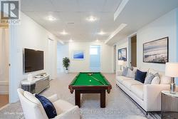 Virtually Staged lower level Games area. - 