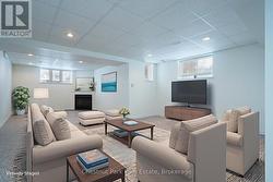 Virtually Staged lower level Recreation Room. - 