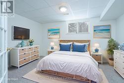 Virtually Staged lower level 4th Bedroom. - 