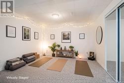 Lower Level Room Virtually Staged as a Yoga Studio - 