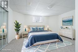 Virtually Staged lower level 5th Bedroom. - 