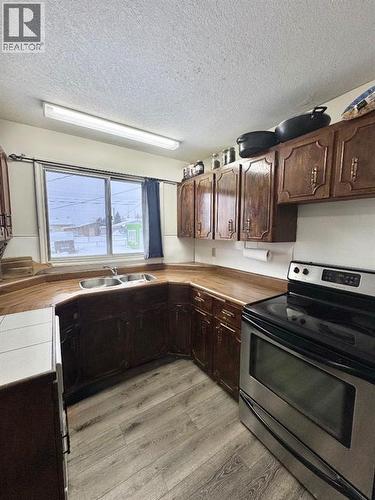 5428 Moosehorn Avenue, Swan Hills, AB - Indoor Photo Showing Kitchen With Double Sink