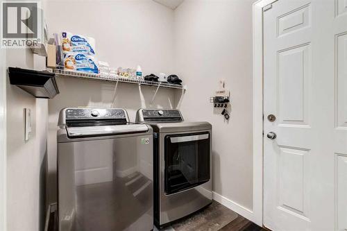 815 Tuscany Drive Nw, Calgary, AB - Indoor Photo Showing Laundry Room