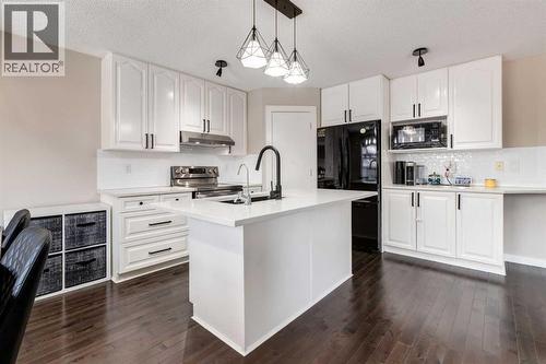 815 Tuscany Drive Nw, Calgary, AB - Indoor Photo Showing Kitchen With Upgraded Kitchen