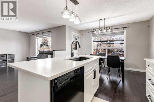 815 Tuscany Drive Nw, Calgary, AB - Indoor Photo Showing Kitchen With Double Sink