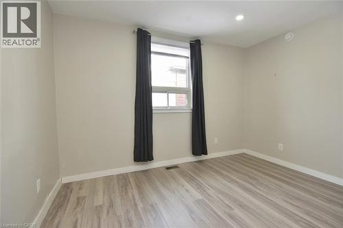 Unfurnished room featuring light wood-style floors and recessed lighting - 371 Fairfield Avenue, Hamilton, ON - Indoor Photo Showing Other Room