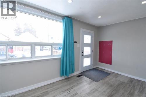 Foyer entrance with light wood-style floors and recessed lighting - 371 Fairfield Avenue, Hamilton, ON - Indoor Photo Showing Other Room