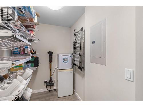Den-currently used for storage with a barndoor to close off the room - 567 Yates Road Unit# 204, Kelowna, BC - Indoor