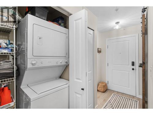 Laundry across from the kitchen. - 567 Yates Road Unit# 204, Kelowna, BC - Indoor Photo Showing Laundry Room