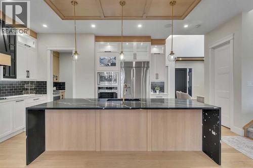 2012 Waterbury Road, Chestermere, AB - Indoor Photo Showing Kitchen With Upgraded Kitchen