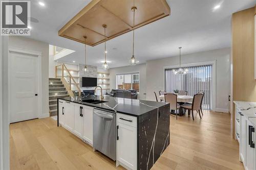 2012 Waterbury Road, Chestermere, AB - Indoor Photo Showing Kitchen With Double Sink With Upgraded Kitchen