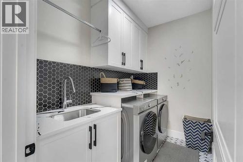 2012 Waterbury Road, Chestermere, AB - Indoor Photo Showing Laundry Room
