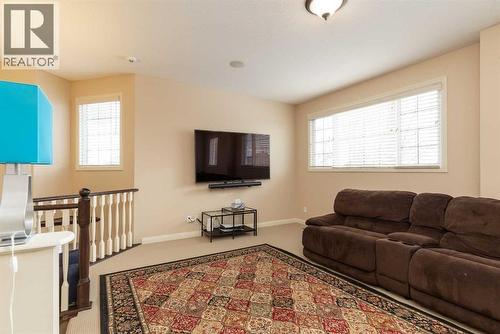 443 Everbrook Way Sw, Calgary, AB - Indoor Photo Showing Living Room