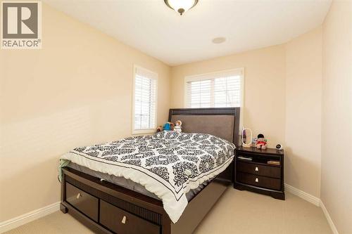 443 Everbrook Way Sw, Calgary, AB - Indoor Photo Showing Bedroom