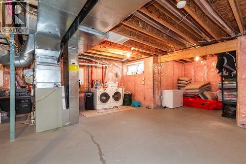 443 Everbrook Way Sw, Calgary, AB - Indoor Photo Showing Basement