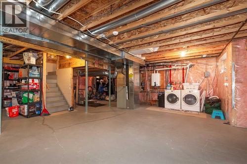 443 Everbrook Way Sw, Calgary, AB - Indoor Photo Showing Basement