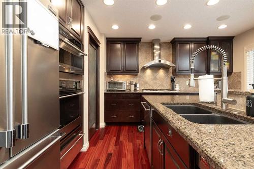 443 Everbrook Way Sw, Calgary, AB - Indoor Photo Showing Kitchen With Double Sink With Upgraded Kitchen