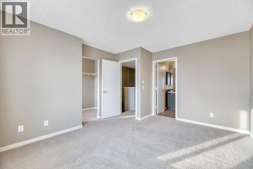 15 Copperpond Close Se, Calgary, AB - Indoor Photo Showing Other Room
