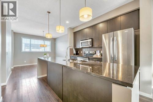 15 Copperpond Close Se, Calgary, AB - Indoor Photo Showing Kitchen With Stainless Steel Kitchen With Upgraded Kitchen