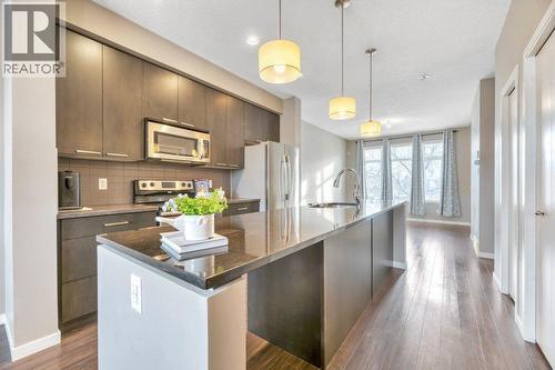 15 Copperpond Close Se, Calgary, AB - Indoor Photo Showing Kitchen With Stainless Steel Kitchen With Upgraded Kitchen