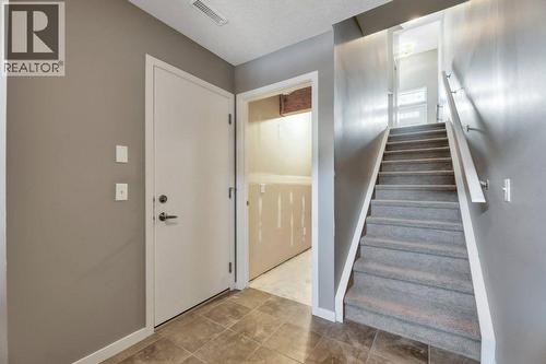 15 Copperpond Close Se, Calgary, AB - Indoor Photo Showing Other Room