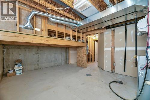 15 Copperpond Close Se, Calgary, AB - Indoor Photo Showing Basement