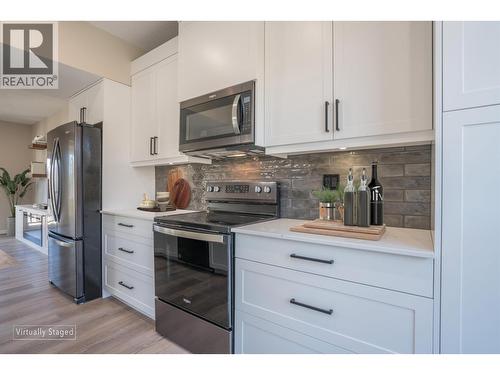 406 7000 Husband Drive, Prince George, BC - Indoor Photo Showing Kitchen With Upgraded Kitchen