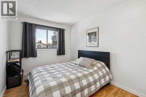 Bedroom #3 - 14 Glenhill Crescent, Cochrane, AB - Indoor Photo Showing Bedroom