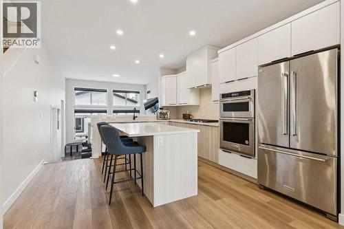 87 Aquila Way Nw, Calgary, AB - Indoor Photo Showing Kitchen With Stainless Steel Kitchen With Upgraded Kitchen