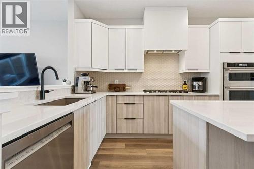 87 Aquila Way Nw, Calgary, AB - Indoor Photo Showing Kitchen With Upgraded Kitchen