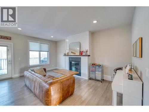 11112 115 Avenue, Fort St. John, BC - Indoor Photo Showing Living Room With Fireplace