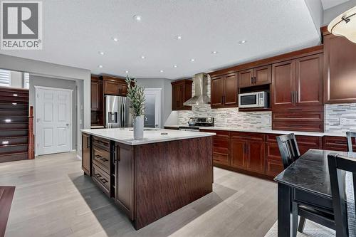 92 Panamount Green Nw, Calgary, AB - Indoor Photo Showing Kitchen With Upgraded Kitchen