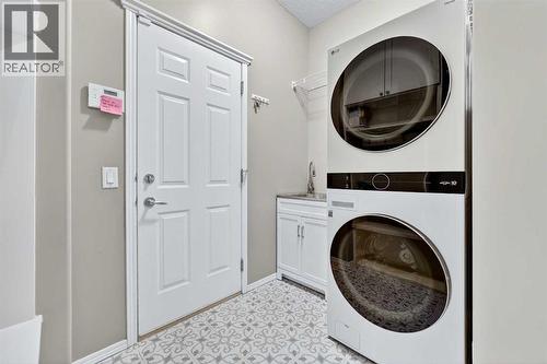 92 Panamount Green Nw, Calgary, AB - Indoor Photo Showing Laundry Room