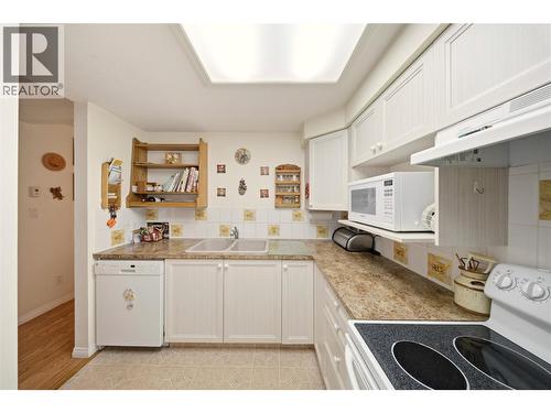 1965 Durnin Road Unit# 116, Kelowna, BC - Indoor Photo Showing Kitchen With Double Sink