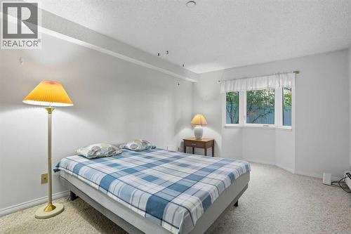 109, 3730 50 Street Nw, Calgary, AB - Indoor Photo Showing Bedroom