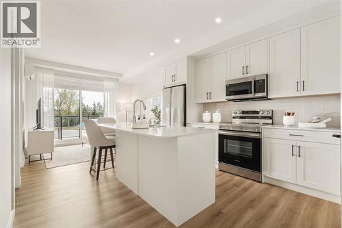 119, 20 Cascade Ridge, Canmore, AB - Indoor Photo Showing Kitchen With Upgraded Kitchen