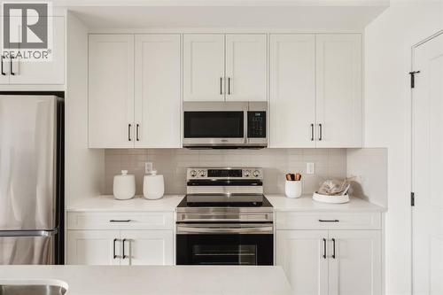 119, 20 Cascade Ridge, Canmore, AB - Indoor Photo Showing Kitchen
