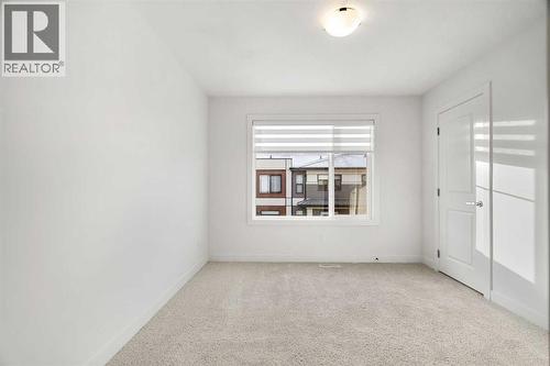 203, 550 Seton Circle Se, Calgary, AB - Indoor Photo Showing Other Room